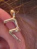 14 Karat Yellow Gold "Little Man" Ear Cuff