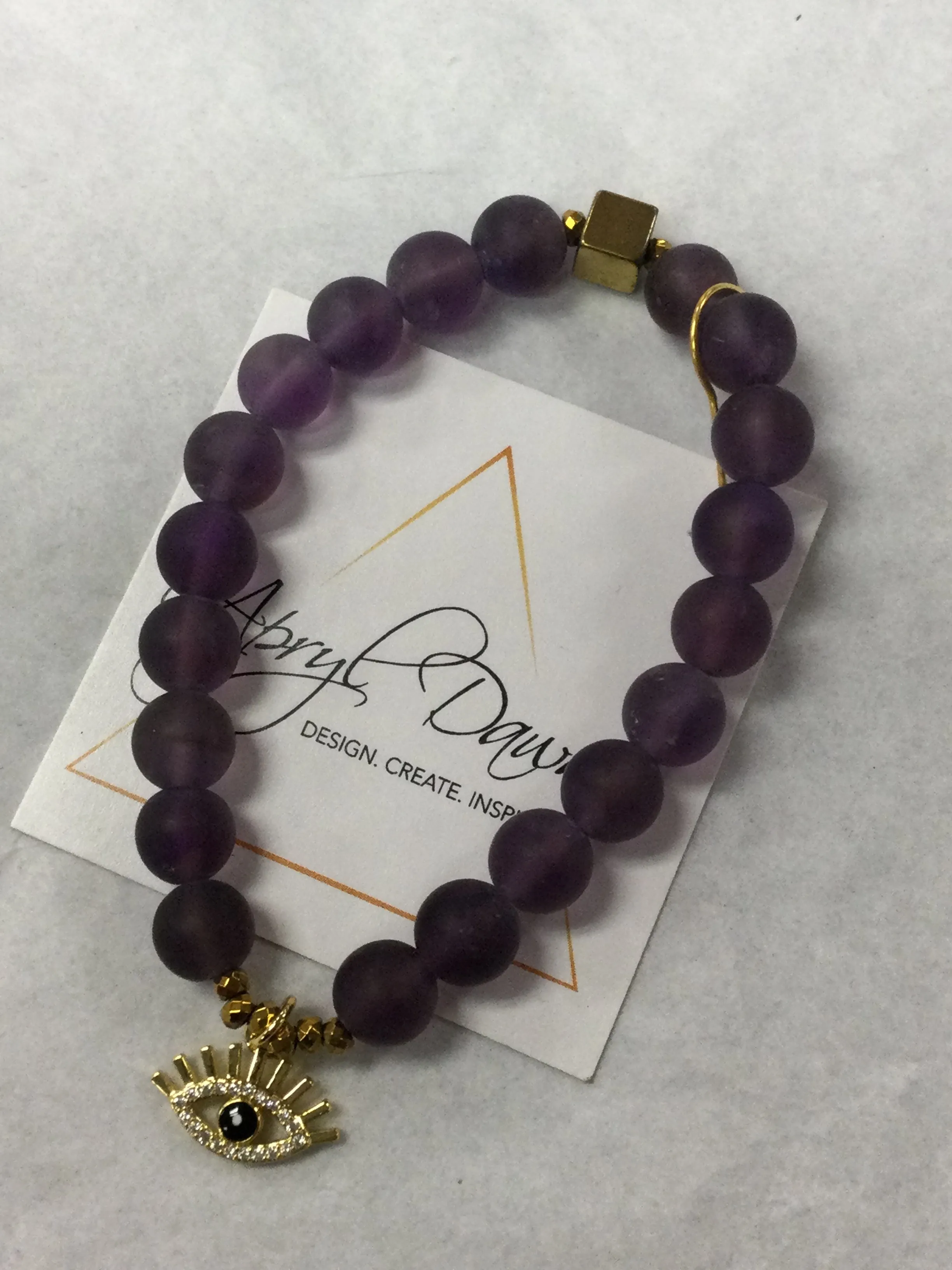 Apryl Dawn Matte Crystal Bracelet with Evil Eye Charm