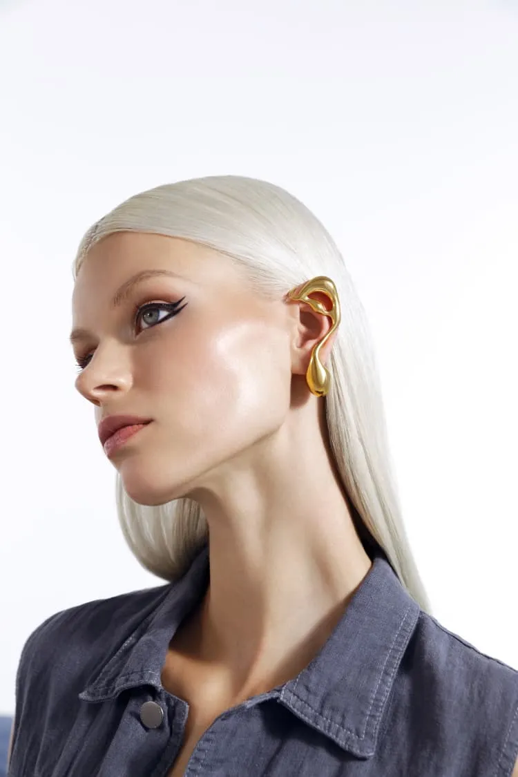 asymmetrical liquid earring in gold