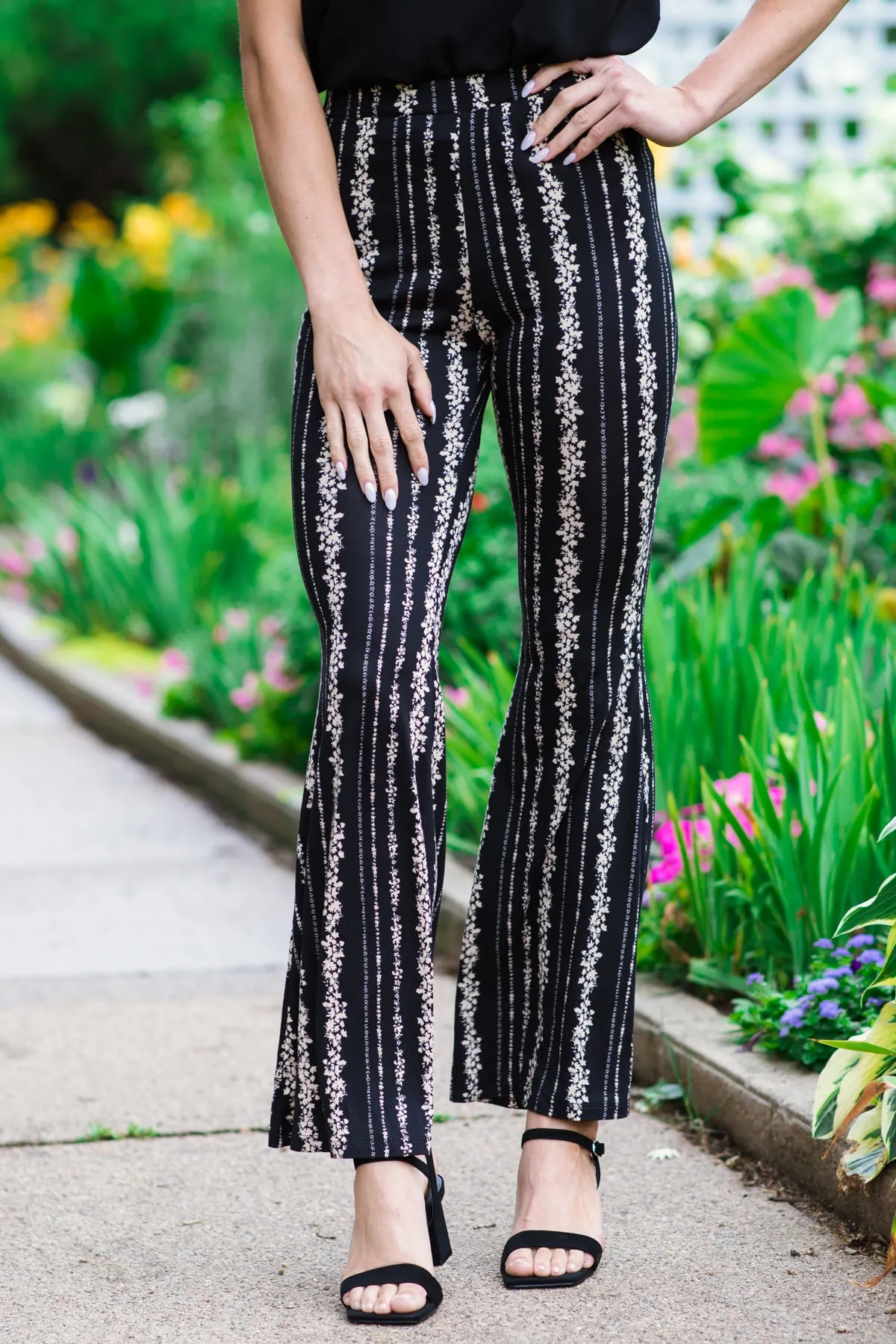 Black and Tan Floral Print Flare Pants