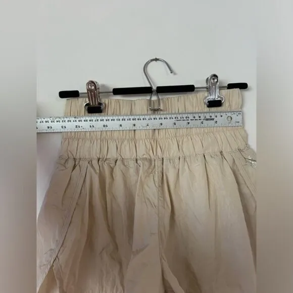 Free people movement high waisted beige/cream shorts size medium