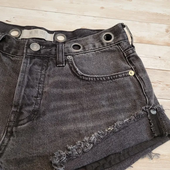 Free People Sashed and Relaxed Grommet Distress Cutoff Denim Shorts Black 24