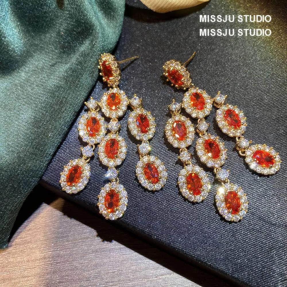 Paved Crystal Ruby Tassel Chandelier Earrings