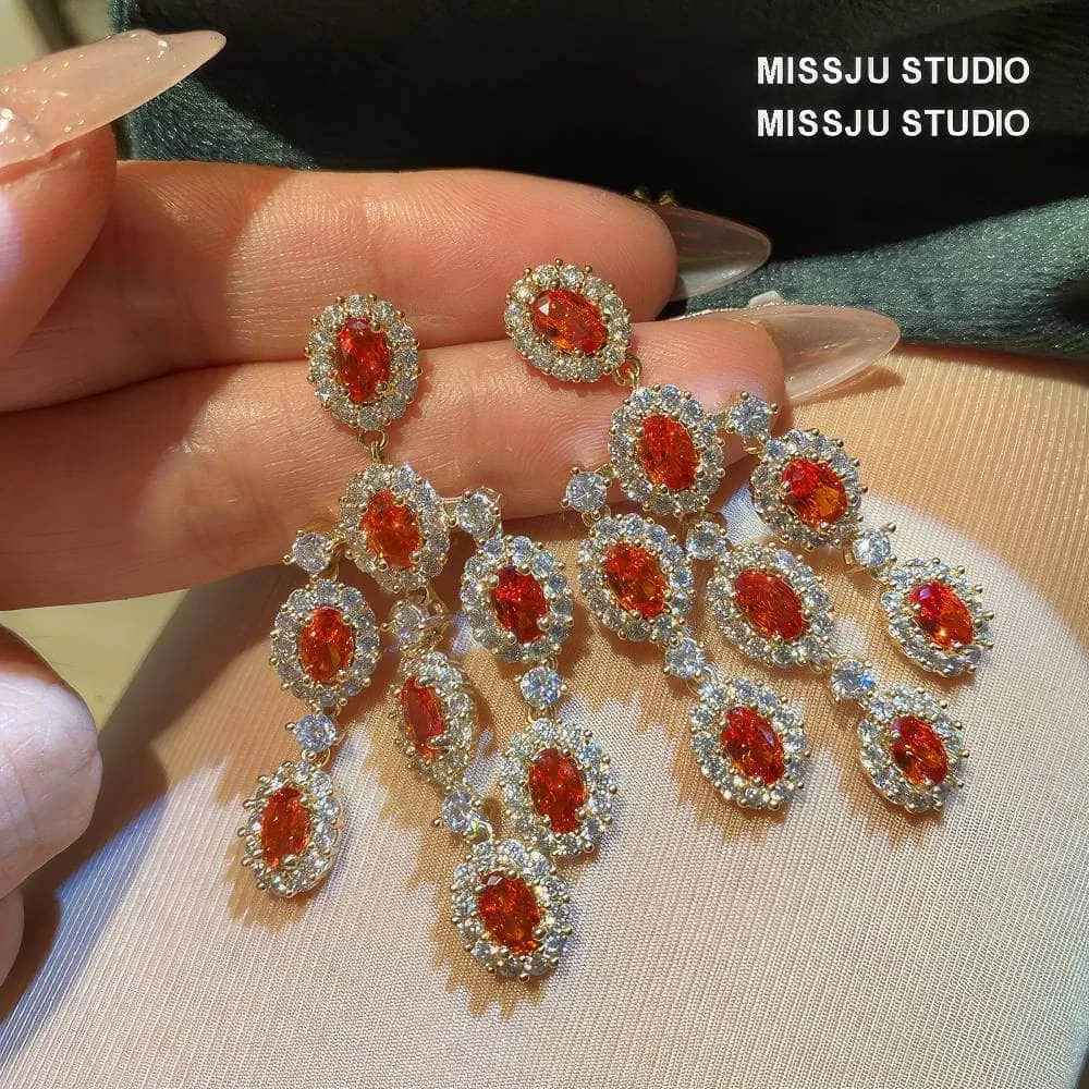 Paved Crystal Ruby Tassel Chandelier Earrings