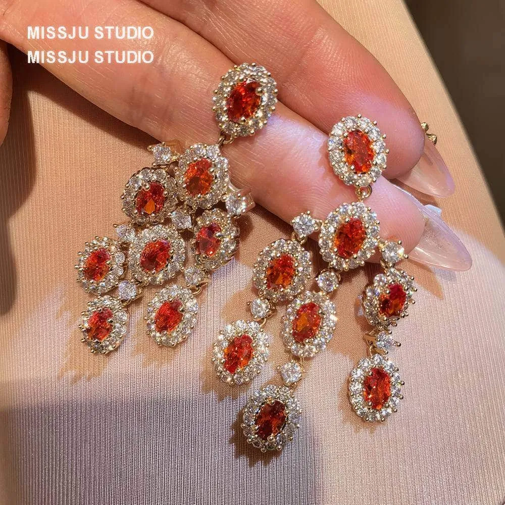 Paved Crystal Ruby Tassel Chandelier Earrings
