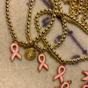 Stainless Steel plated stretchy bracelets with pink ribbon charm  430-08 | Erika Williner Designs