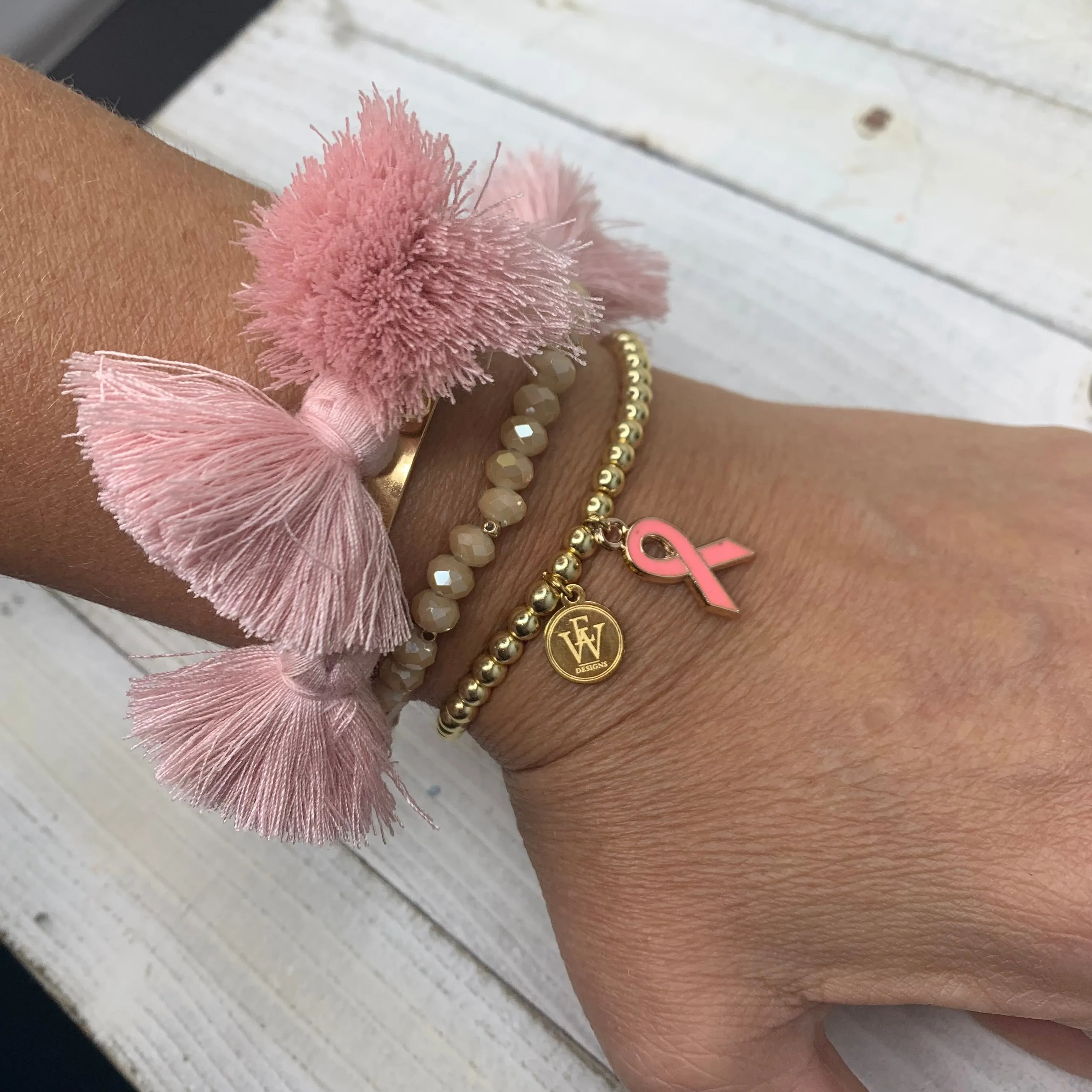 Stainless Steel plated stretchy bracelets with pink ribbon charm  430-08 | Erika Williner Designs